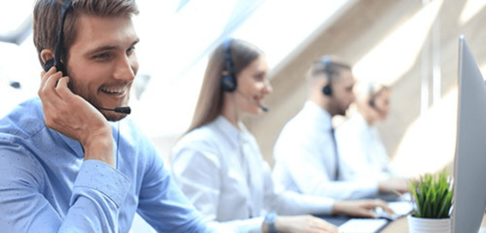 Customer service representatives on headsets