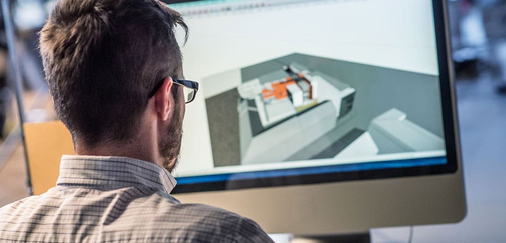 Man working on computer design software